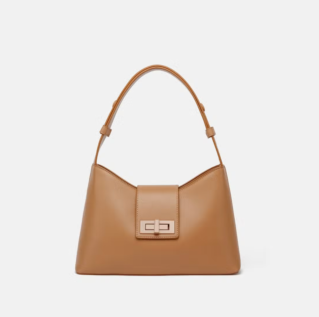 Turn Key Shoulder Bag